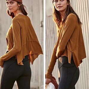 Free people movement top in mustard Sz small